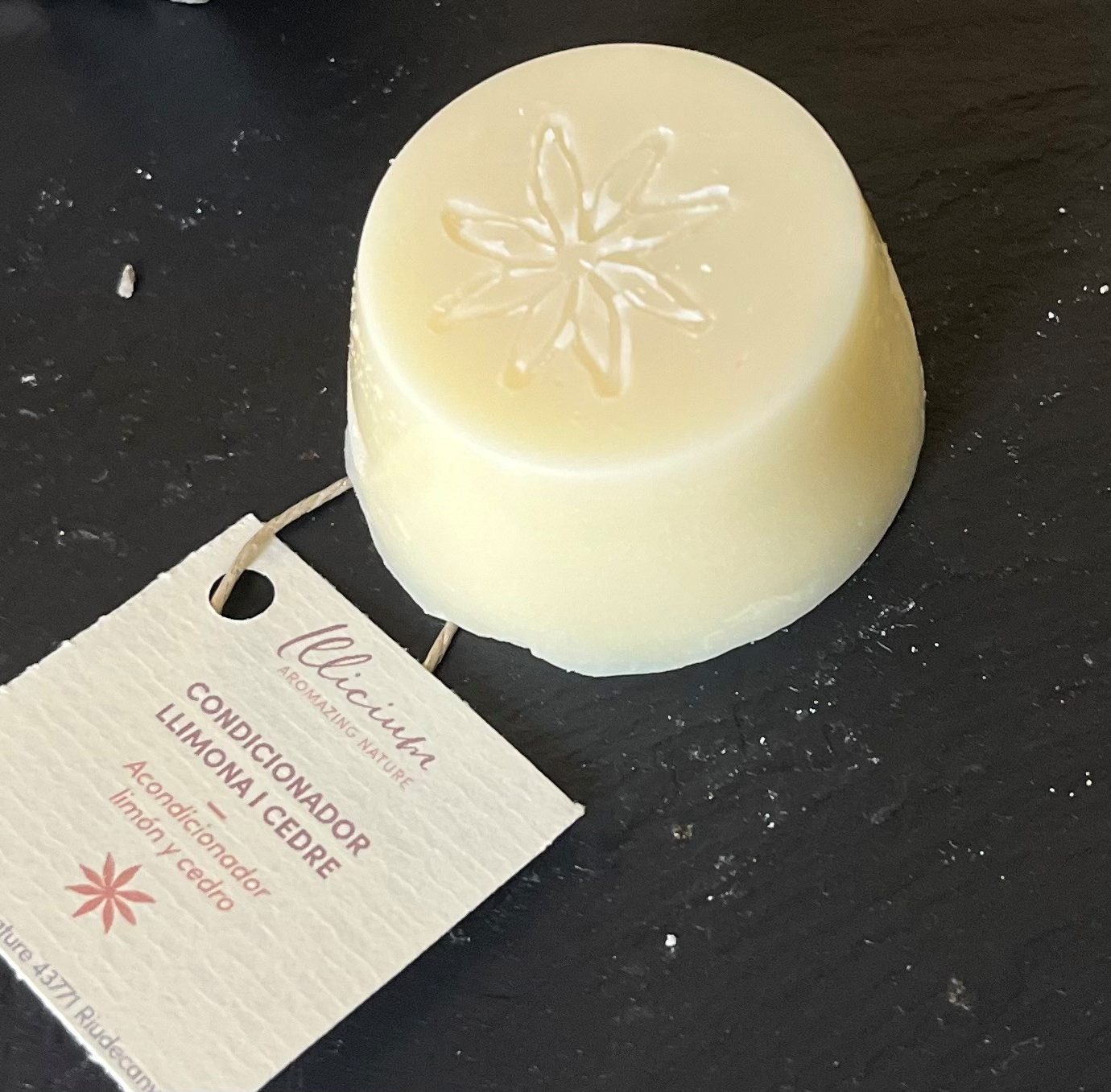 White conditioner bar with lemon and cedar tree